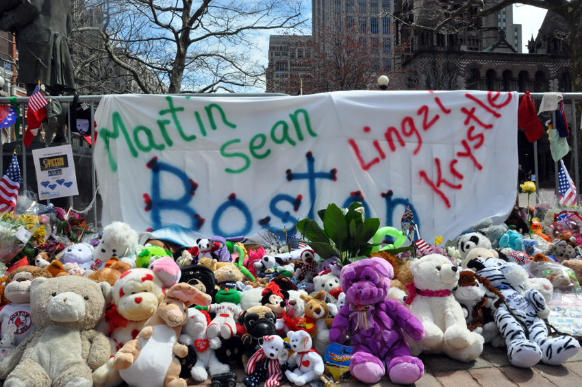 Stuffed animals lined up to honor and remember victims. Photo by Regina Mogilevskaya