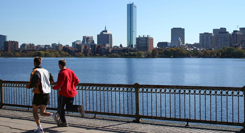 Joggers along the Charles. Photo via Shutterstock.