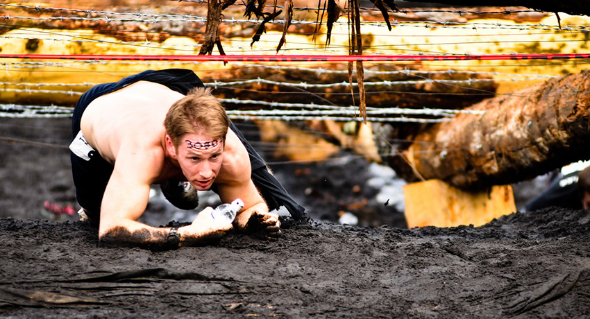 If mud and barbed wire is your thing, then this race round-up is for you. Photo via Flickr/Couloir