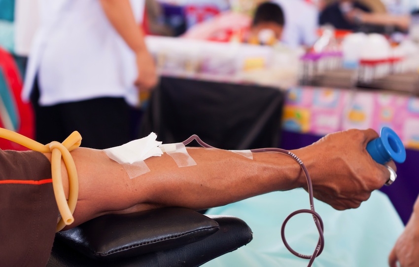 Blood donor arm image via Shutterstock.