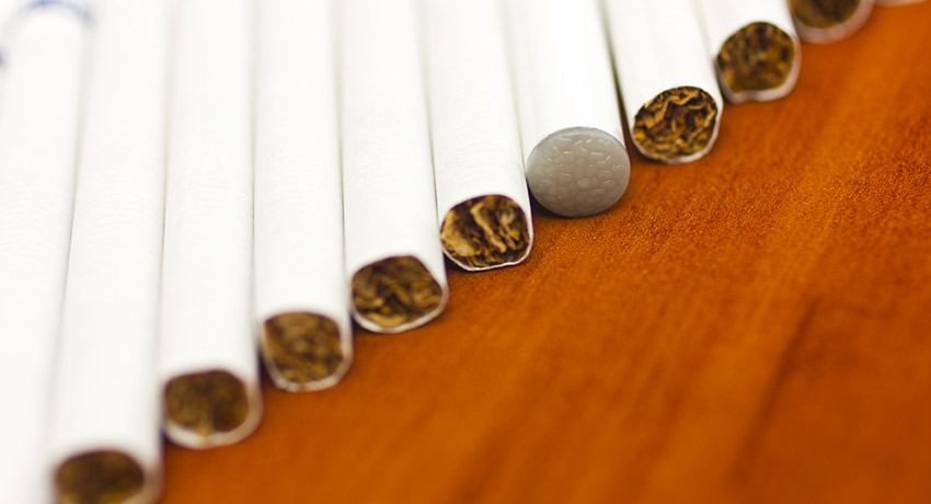 One of these things is not like the others. Cigarettes image via Shutterstock.
