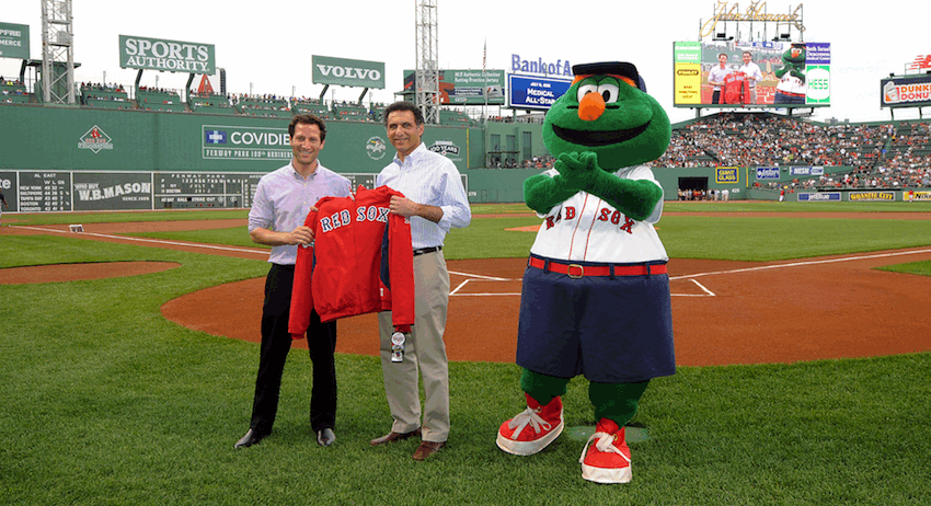Dr. Morgentaler, center, is honored by the Red Sox as a 