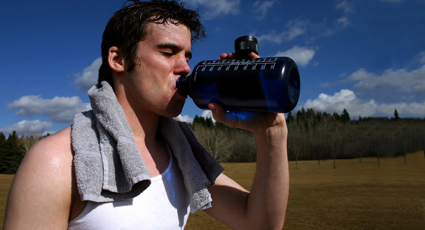 Hydration is key. Post-outdoor workout photo via shutterstock