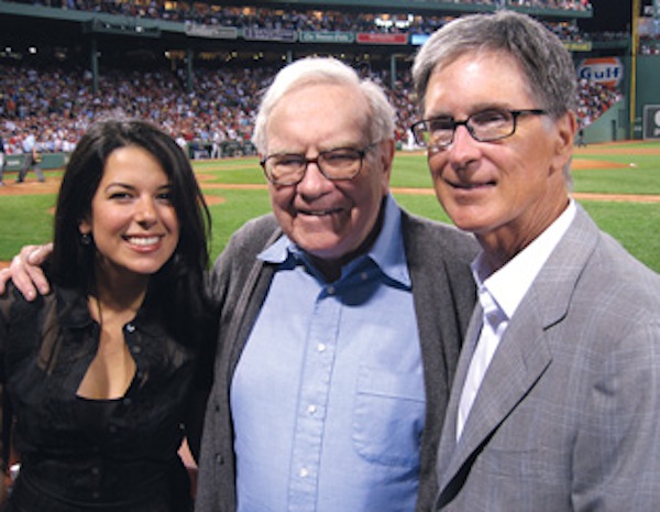 John Henry and his wife pose with (fellow newspaper entrepreneur) Warren Buffet. 
