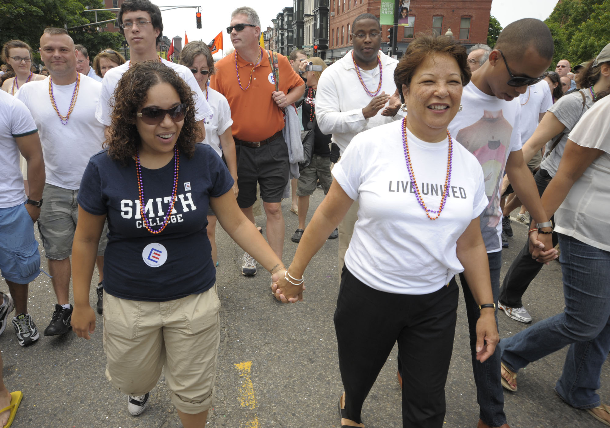 Katherine Patrick, left, holds hands with her mother, Diane Patrick. / File Photo via AP