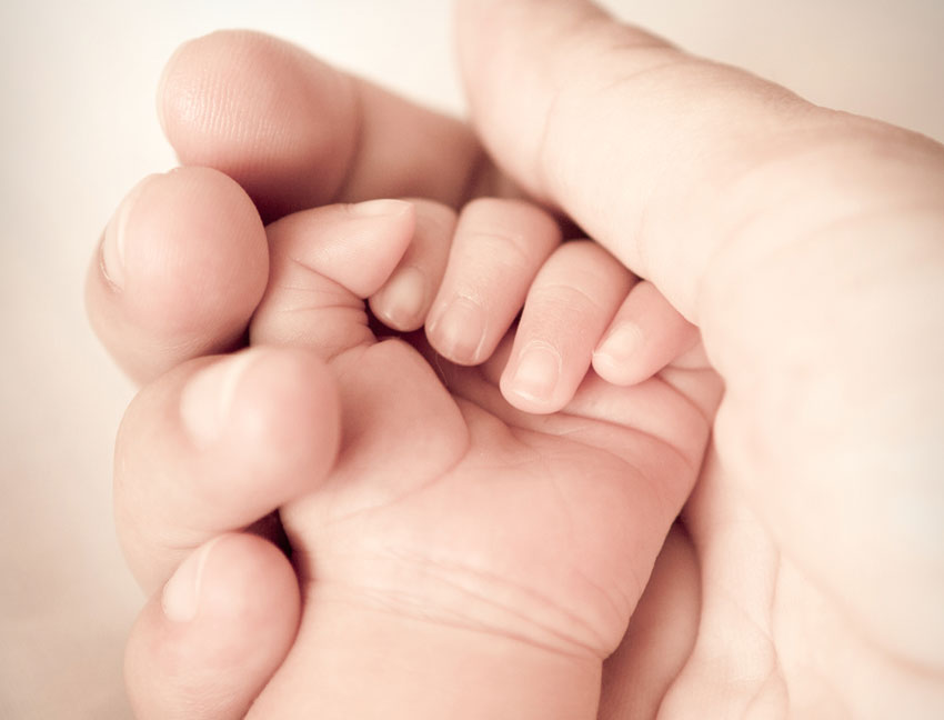baby hand image via shutterstock