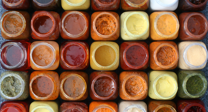 Dipping sauces in jars image via shutterstock