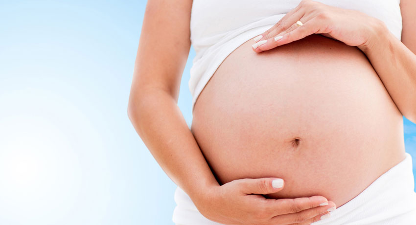 Pregnant belly image via shutterstock