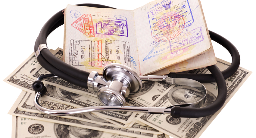 Passport, money, and stethoscope image via shutterstock