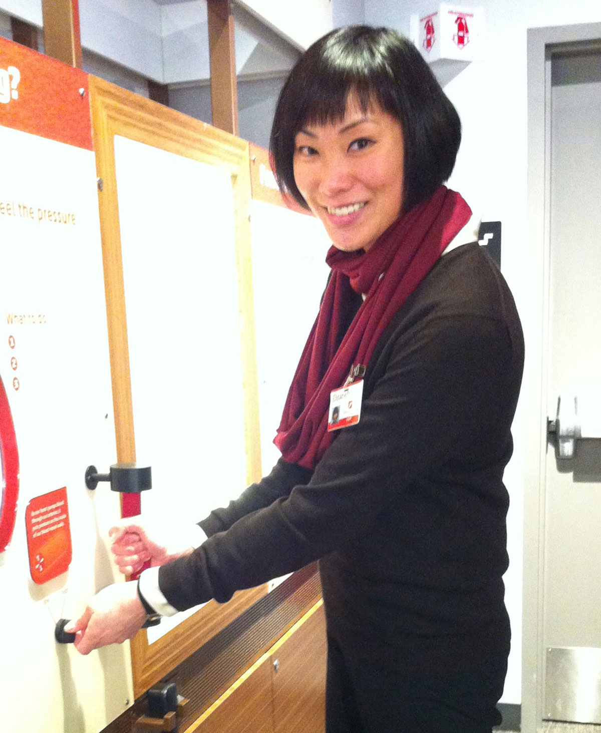 Exhibit Manager Elizabeth Kong at Hypertension Station