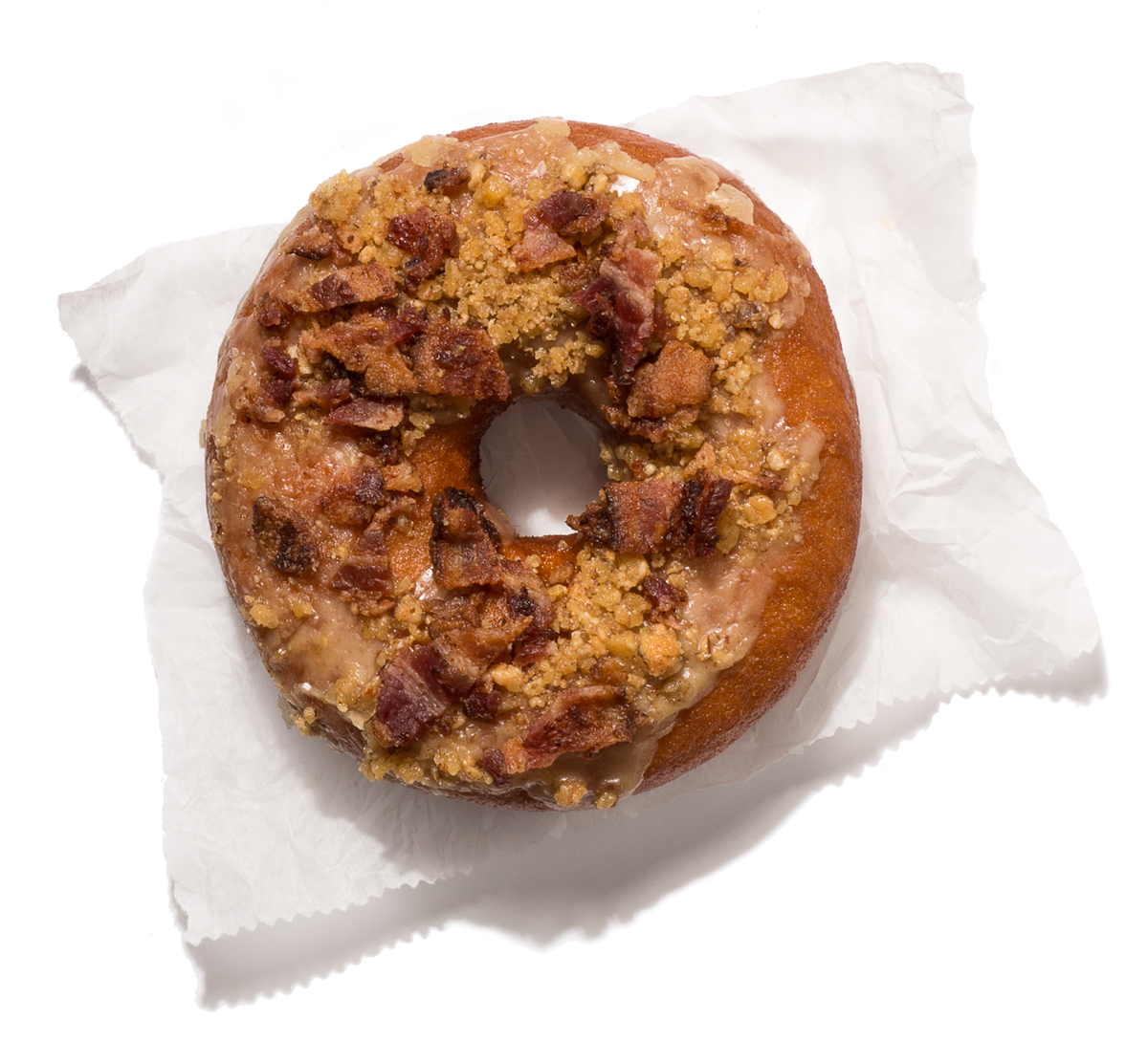 Island Creek Oyster Bar's new brown butter bacon doughnut with pecan toffee crumble. Photo by Toan Trinh