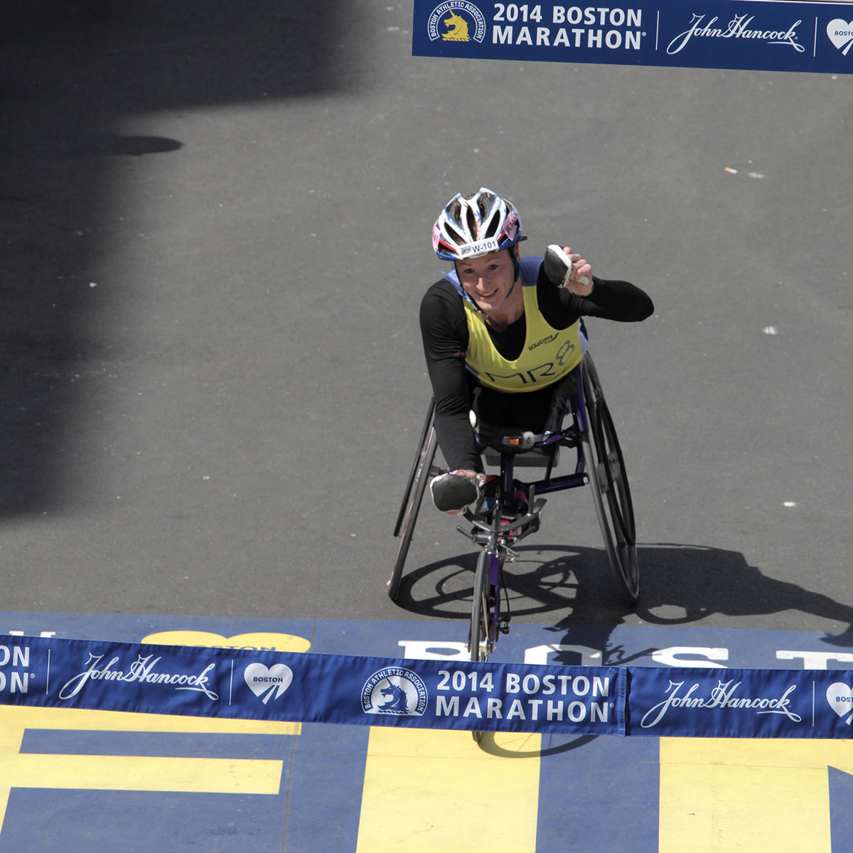 Tatyana McFadden crossing the finish line for her second consecutive Boston Marathon win. 