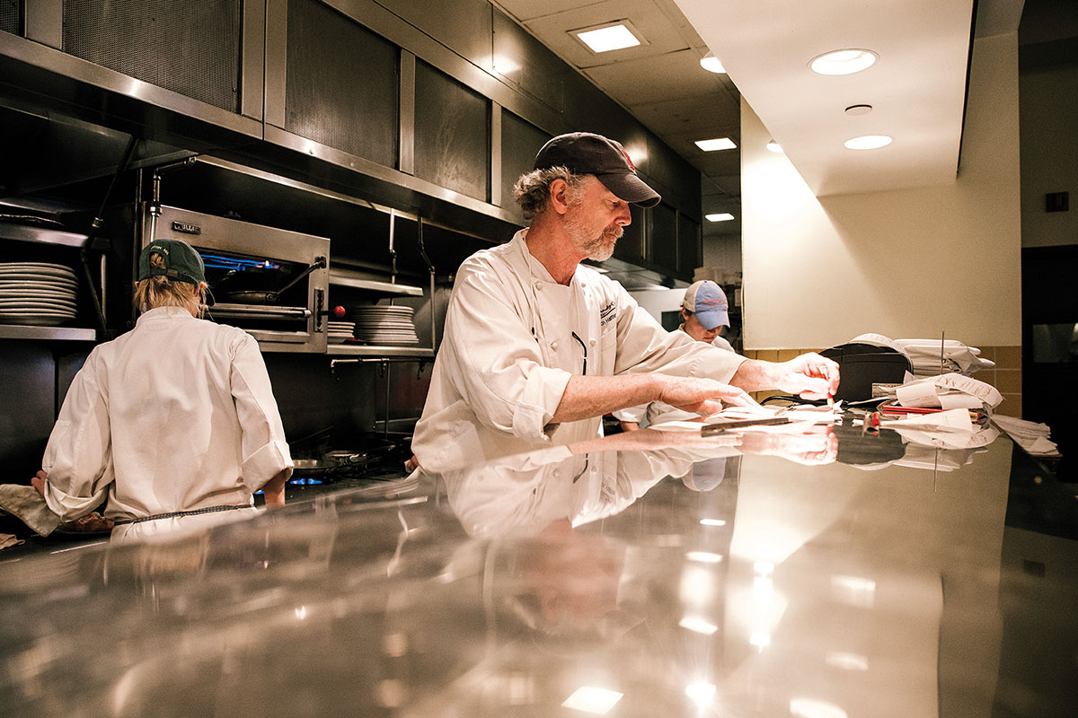 The chef behind the pass. Photo by David Salfia