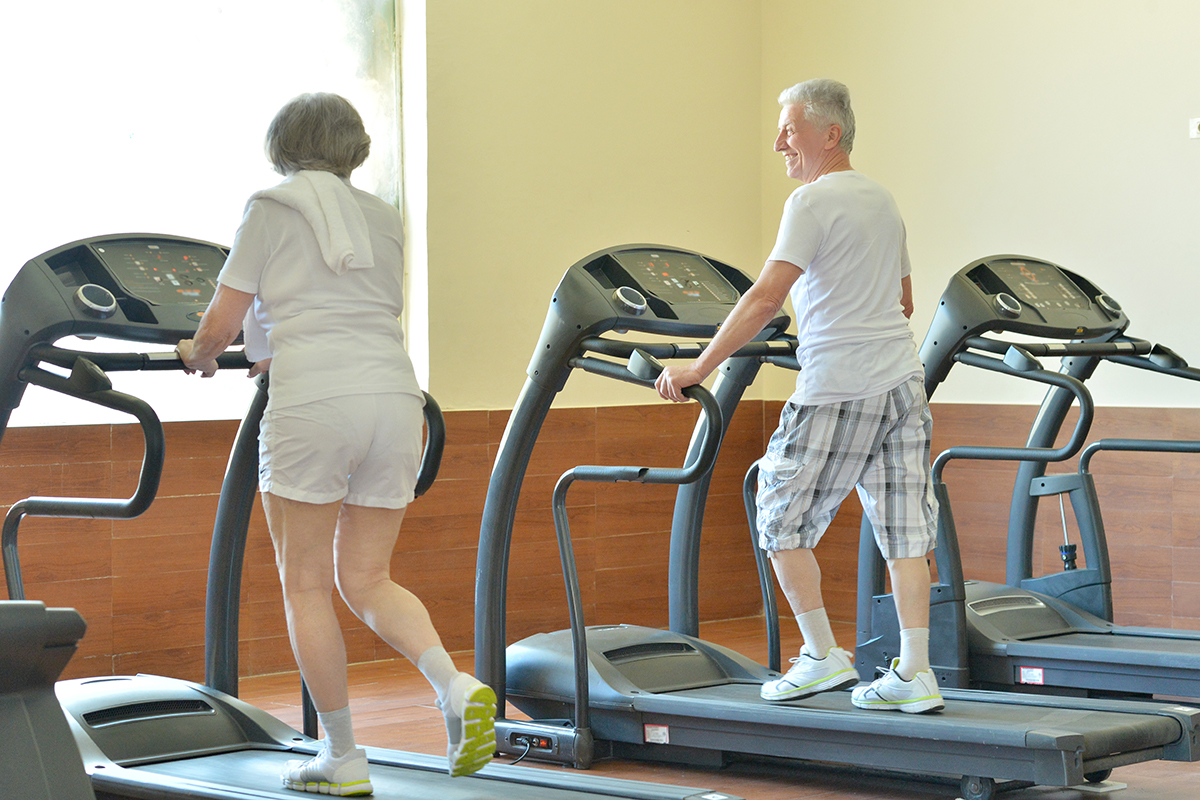 Senior couple on treadmills image via shutterstock 