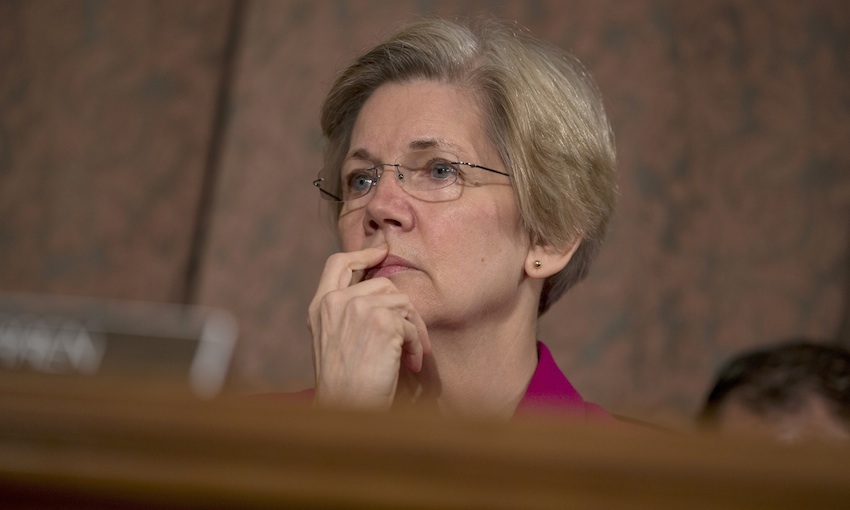 Senate Banking Committee member Sen. Elizabeth Warren, D-Mass. listens on Capitol Hill, in Washington, Tuesday, May 21, 2013, as Treasury Secretary Jacob Lew testifies before the committee.  Lew said the Internal Revenue Service's targeting of conservative political groups was "unacceptable and inexcusable" and he has directed the agency's acting director to hold people accountable.  (AP Photo/Evan Vucci)