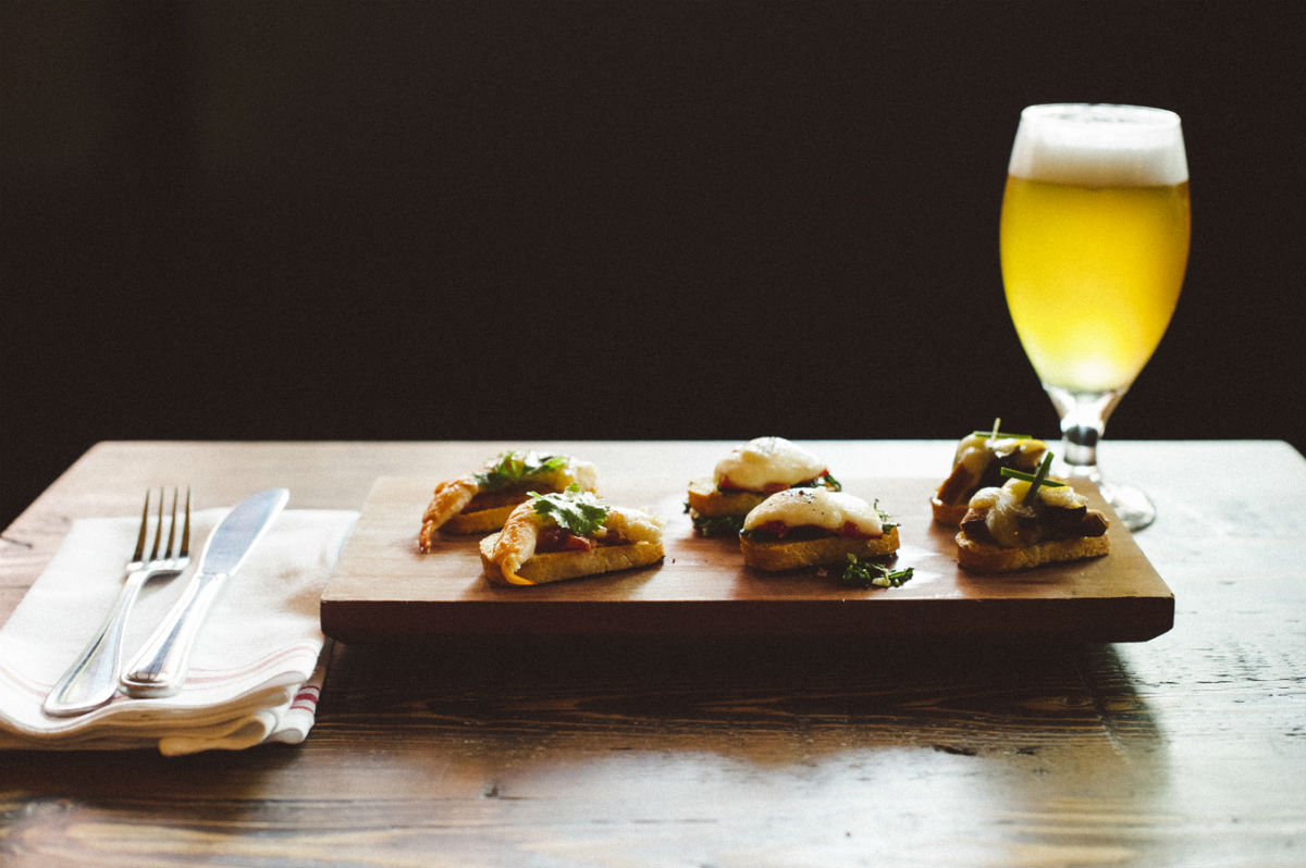 The Russell House's Sons of Liberty dinner features hop-smoked lardo toast