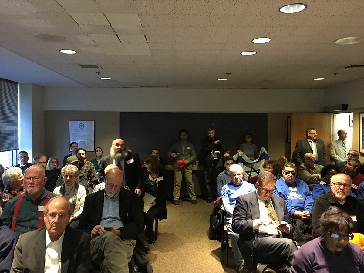 Palestinian and Israeli activists pack an MBTA Board meeting in November 2015.