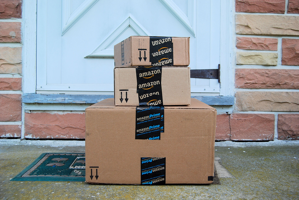 Image of Amazon packages photo via Shutterstock