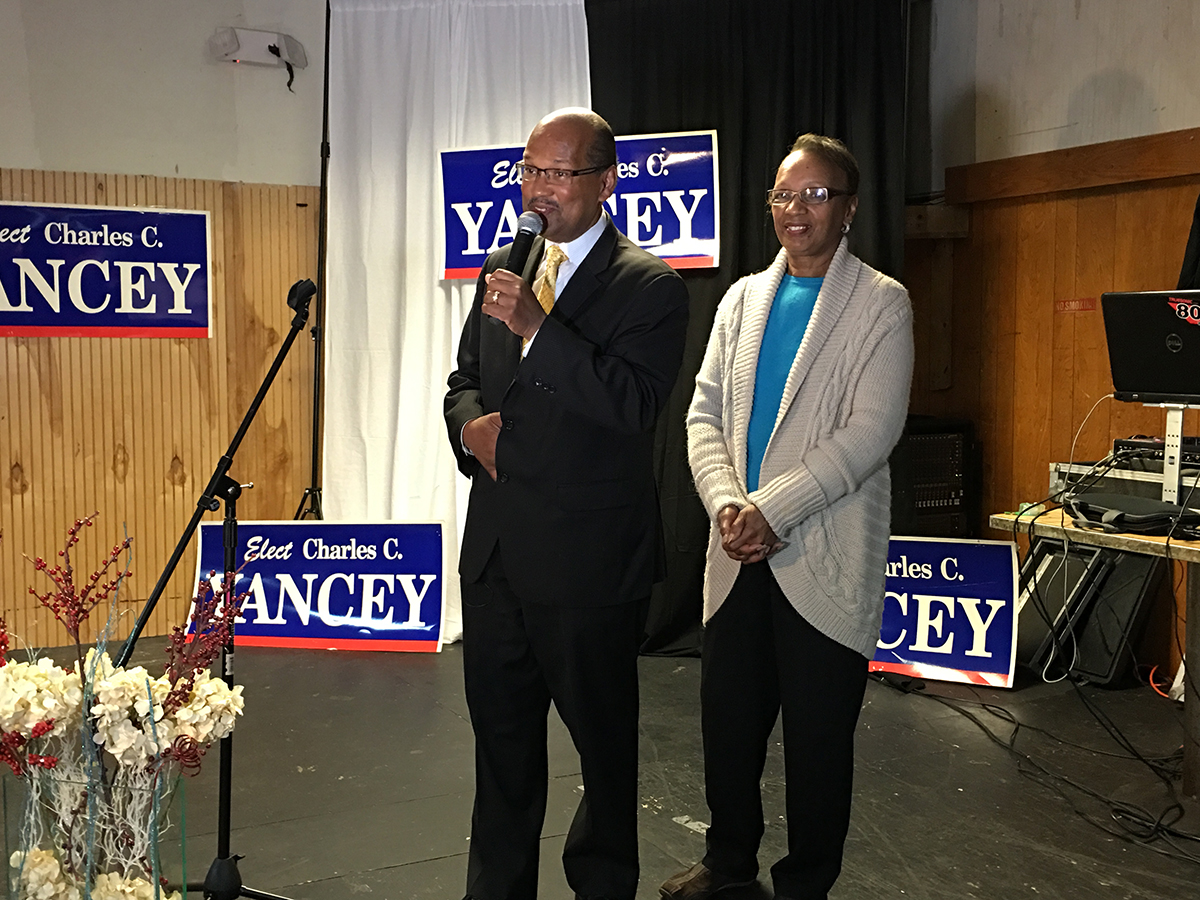 Charles and Marzetta Yancey speaking at his election night party. Photo by Garrett Quinn