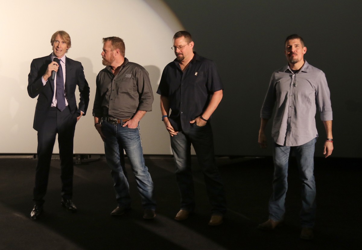 AVENTURA, FL - JANUARY 07: Director Michael Bay, Co-author of "13 Hours" Mark "Oz" Geist, Co-author of "13 Hours" John "Tig" Tiegen and Kris "Tanto" Paronto attends the Miami Fan Screening of the Pramount Pictures film "13 Hours: The Secret Soldiers of Benghazi" at the AMC Aventura on January 7, 2016 in Miami, Florida. (Photo by John Parra/Getty Images for Paramount Pictures) *** Local Caption *** Kris Paronto; Michael Bay; John Tiegen; Kris Paronto
