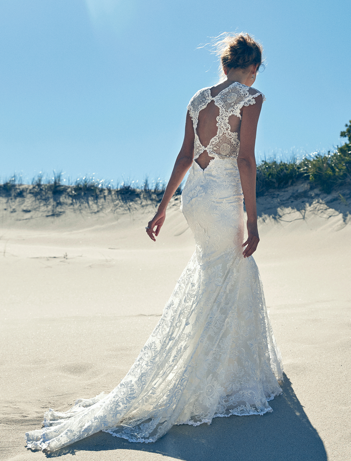 Claire Pettibone “Jophiel” embroidered guipure gown with sequins