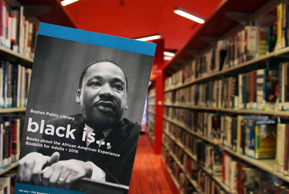 A "Black Is..." booklist brochure in the library. 