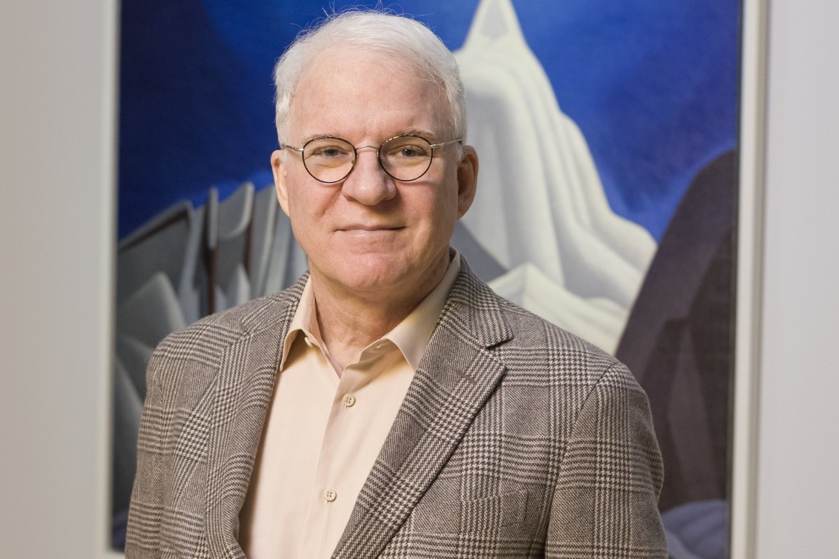 Guest curator Steve Martin during the installation of the exhibition The Idea of North: The Paintings of Lawren Harris at the Museum of Fine Arts, Boston.March 8, 2016 Saundra and William H. Lane Galleries * Photograph © Museum of Fine Arts, Boston