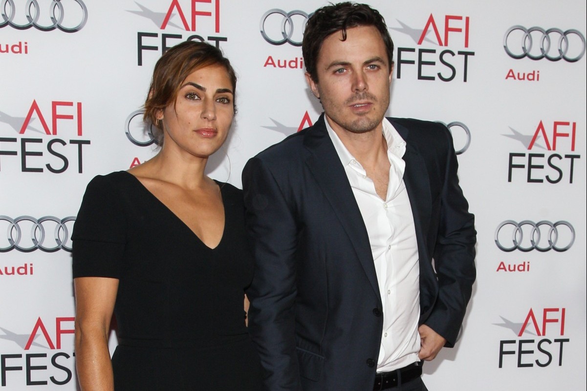 Actor Casey Affleck and wife / actress Summer Phoenix arrive at the 2013 AFI Fest premiere of "Out of the Furnace" at the TCL Chinese Theatre on Saturday, Nov. 9, 2013 in Los Angeles. (Photo by Paul A. Hebert/Invision/AP)