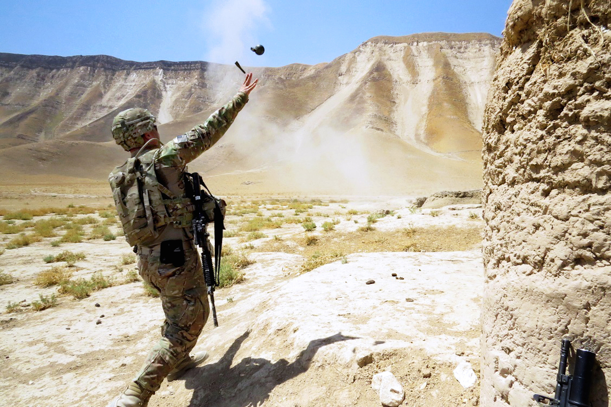U.S. Army Lt. Charles Morgan throws a M67 fragmentation grenade in Afghanistan. Photo by Sgt. Avila/U.S. Army