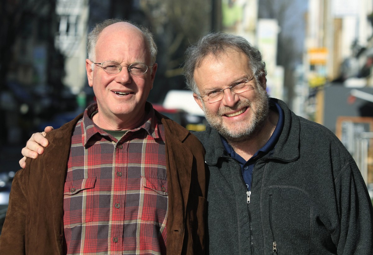 Ben Cohen, left, and Jerry Greenfield, right, cofounders of the Ben & Jerry ice-cream company, pose for the Associated Press in central London, Wednesday Feb. 17, 2010. Ben & Jerry's is stepping up its commitment to ethical business, announcing Thursday Feb. 18, 2010 that all its 58 flavors of icecream _ sold in 39 countries around the world _ will be sourced from fair trade certified products by the end of 2013.Greenfield and Cohen no longer have any board or management position at Ben & Jerry's, which has annual global sales of 500 million US dollars, after selling the company to Anglo-Dutch food major Unilever NV in 2000. But they are still engaged with the company they started with a single ice cream parlour in a renovated gas station in downtown Burlington, Vermont, in 1979 and continue to act as watchdogs for the company's progress on social values. (AP Photo/Lefteris Pitarakis)