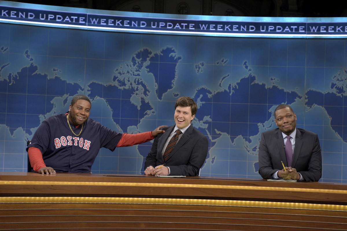 SATURDAY NIGHT LIVE -- "Peter Dinklage" Episode 1699 -- Pictured: (l-r) Kenan Thompson as David Ortiz, Colin Jost, and Michael Che during Weekend Update on April 2, 2016 -- (Photo by: Dana Edelson/NBC)