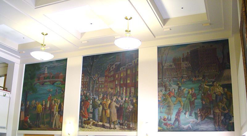 Three of the murals in the  building's lobby. / Photo courtesy of MIT