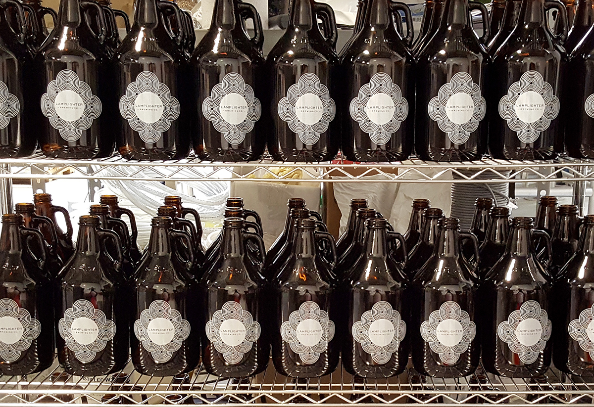 Growlers at Lamplighter Brewing Company. / Photo provided