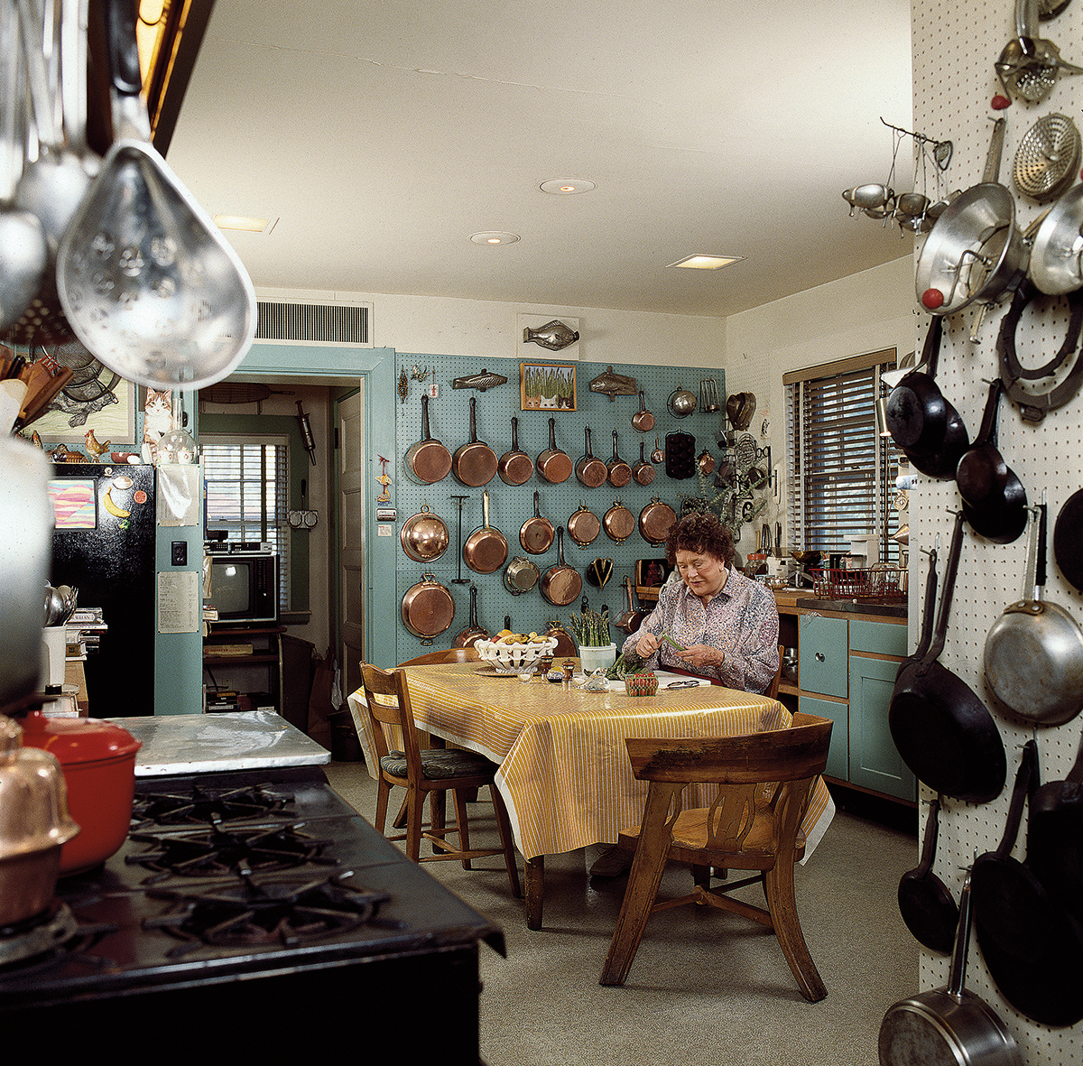Julia Child at her kitchen table in Cambridge.