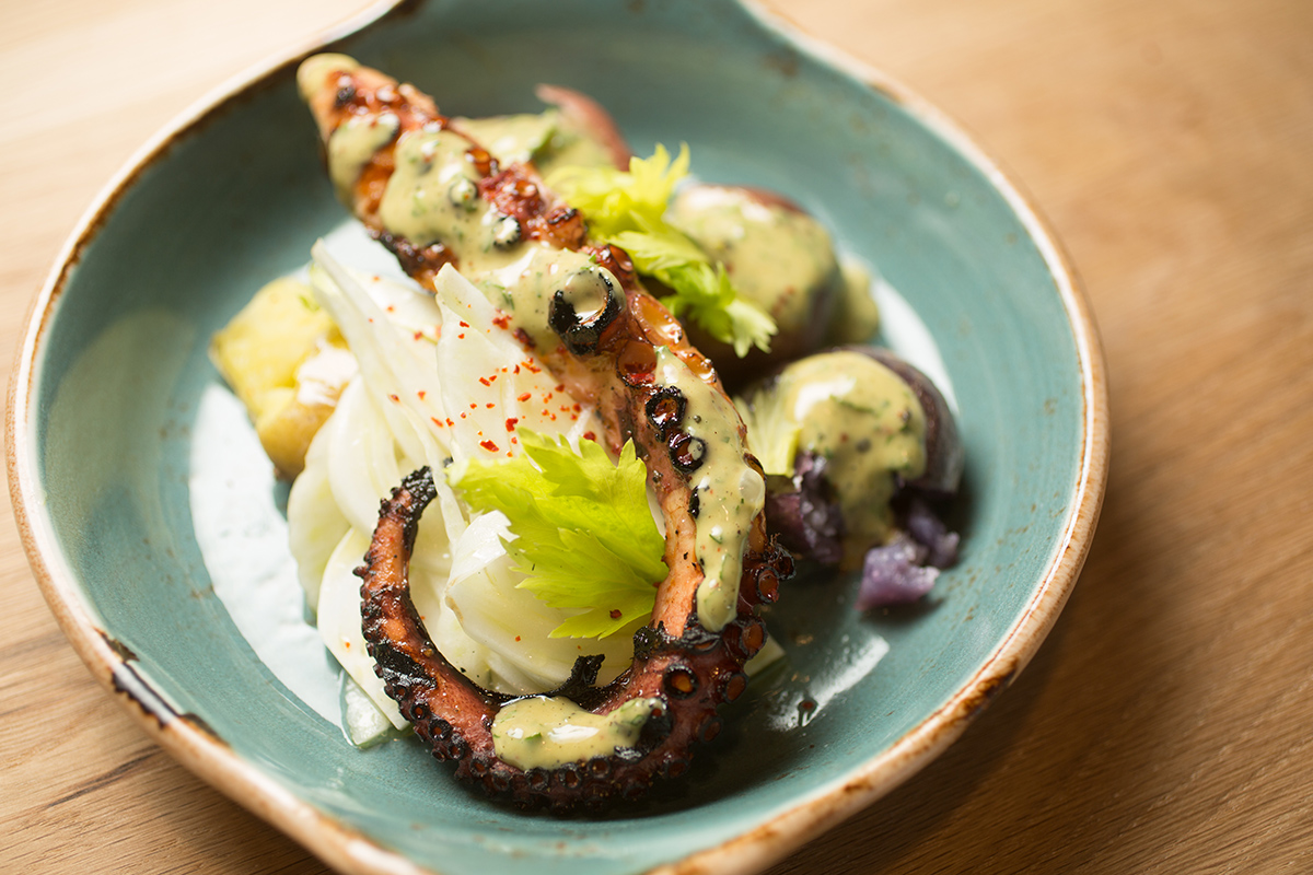 Spicy grilled octopus with boiled potatoes, ‘sapori di mare’ maionese, fennel bulb and celery leaf. / Photo by Erik Jacobs / JacobsPhotographic