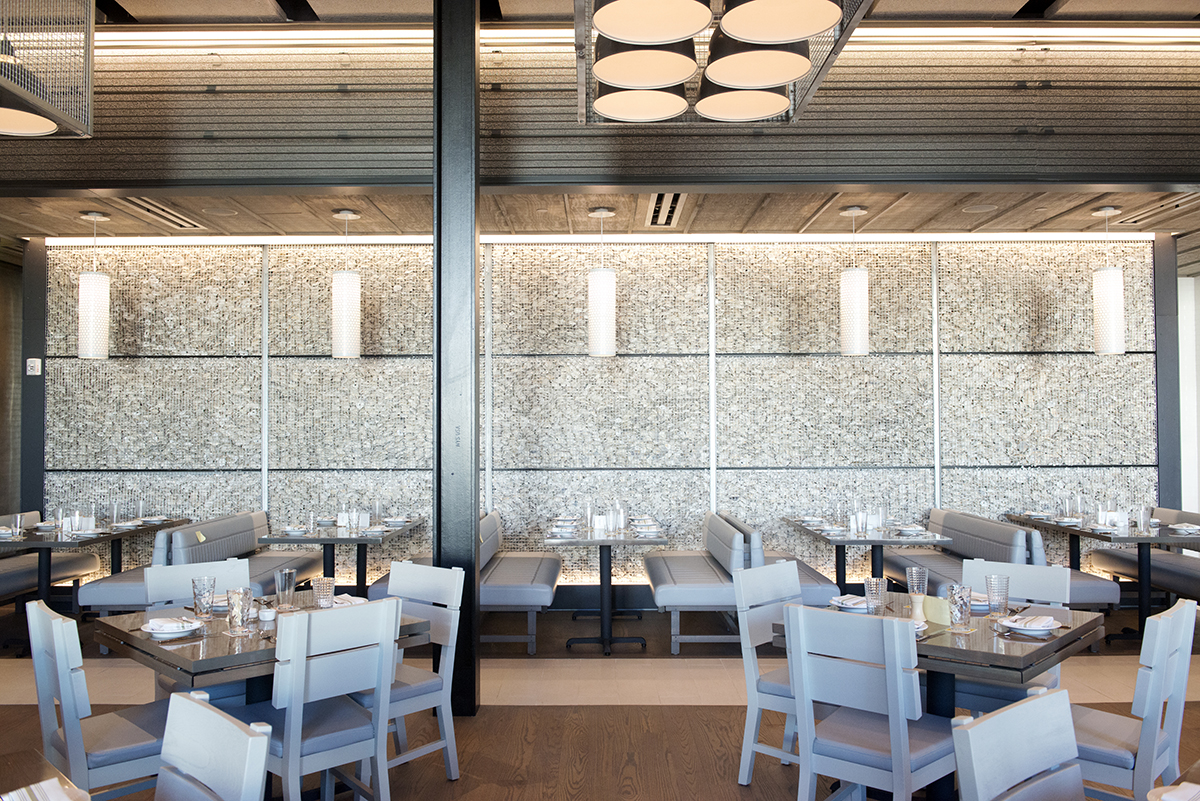 The main dining room and Gabion wall at Island Creek Oyster Bar in Burlington