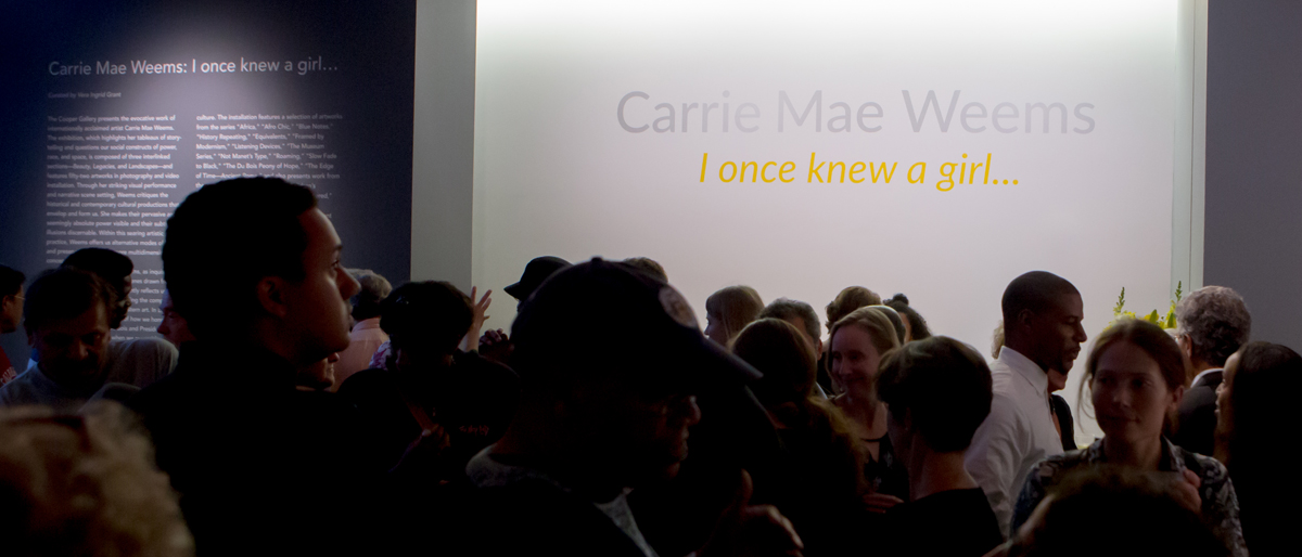 Public visitors attend opening reception of “Carrie Mae Weems: I once knew a girl…“ exhibition running at The Ethelbert Cooper Gallery of African & African American Art in Harvard Square, Cambridge thru January 7, 2017. Photo Credit: Melissa Blackall.