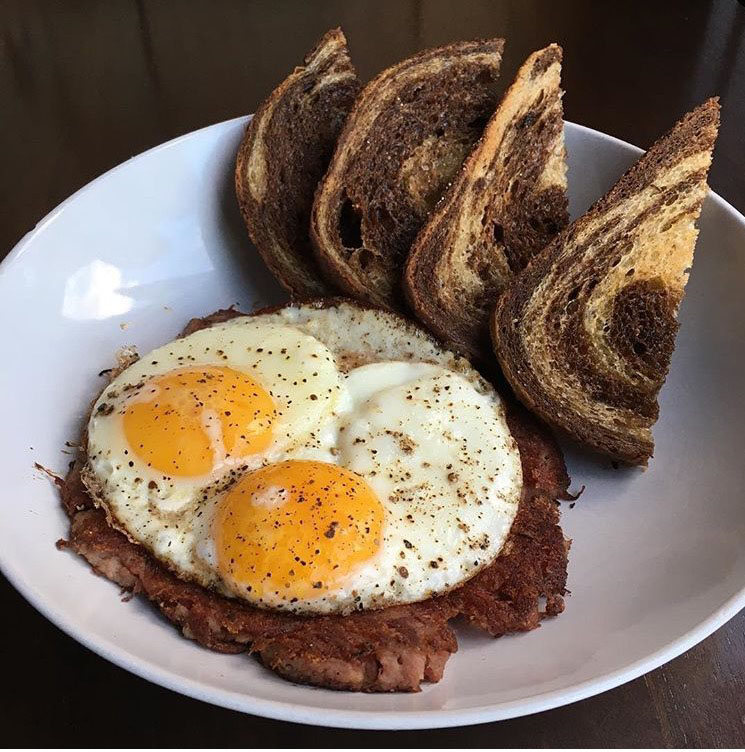 Corned beef hash, sunny eggs, and rye toast from the Gallows' brunch—and Monday brinner—menu