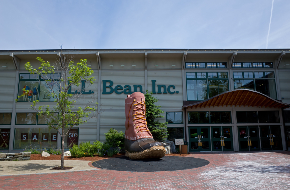 Freeport, Maine, USA-June 17, 2014: L.L.Bean is an American privately held mail-order, online, and retail company founded in 1912 by Leon Leonwood Bean. A replica of its famous boot stands in front of the store.