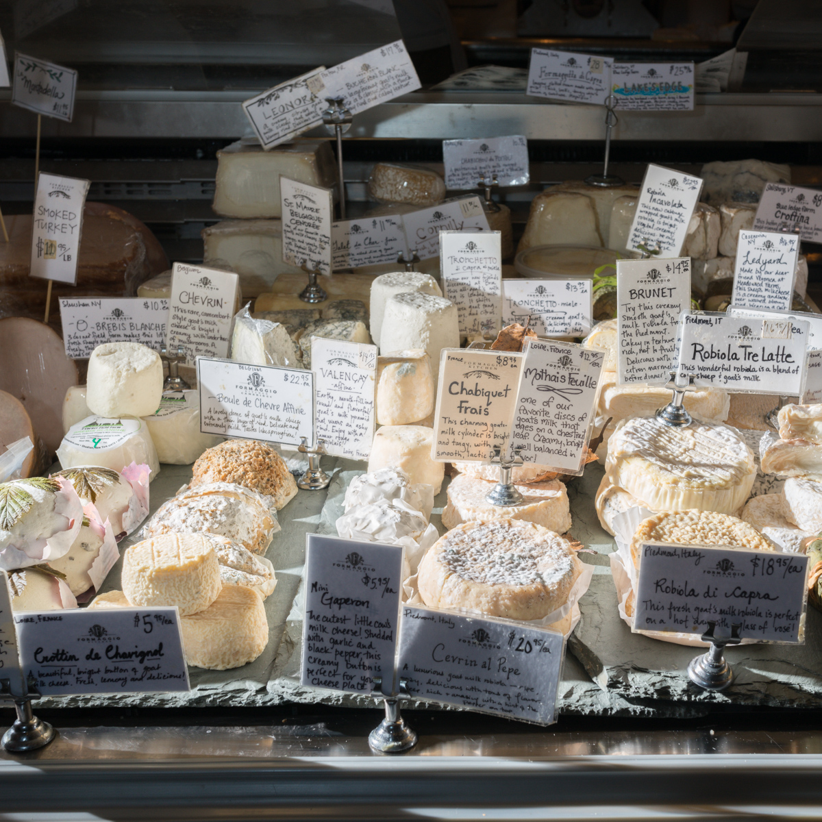 The cheese case at Formaggio Kitchen's flagship location in Huron Village