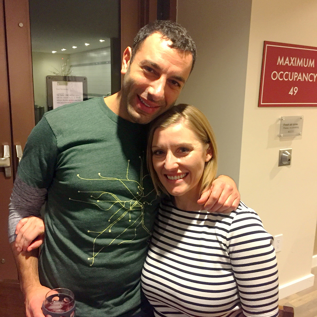Ashley and Panos outside of Suite 1100 / Photo provided