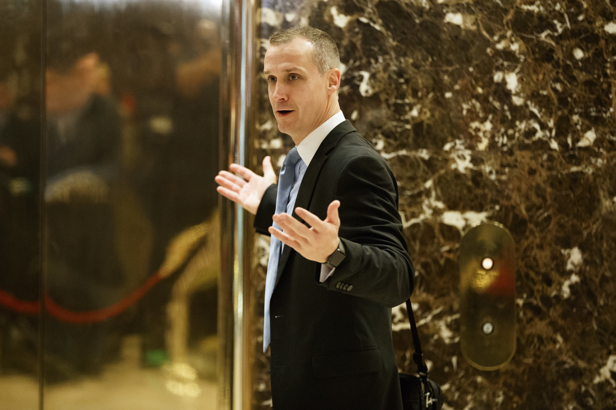 Corey Lewandowski, former campaign manager for President-elect Donald Trump, talks with reporters as he arrives at Trump Tower, Tuesday, Nov. 29, 2016, in New York. (AP Photo/Evan Vucci)