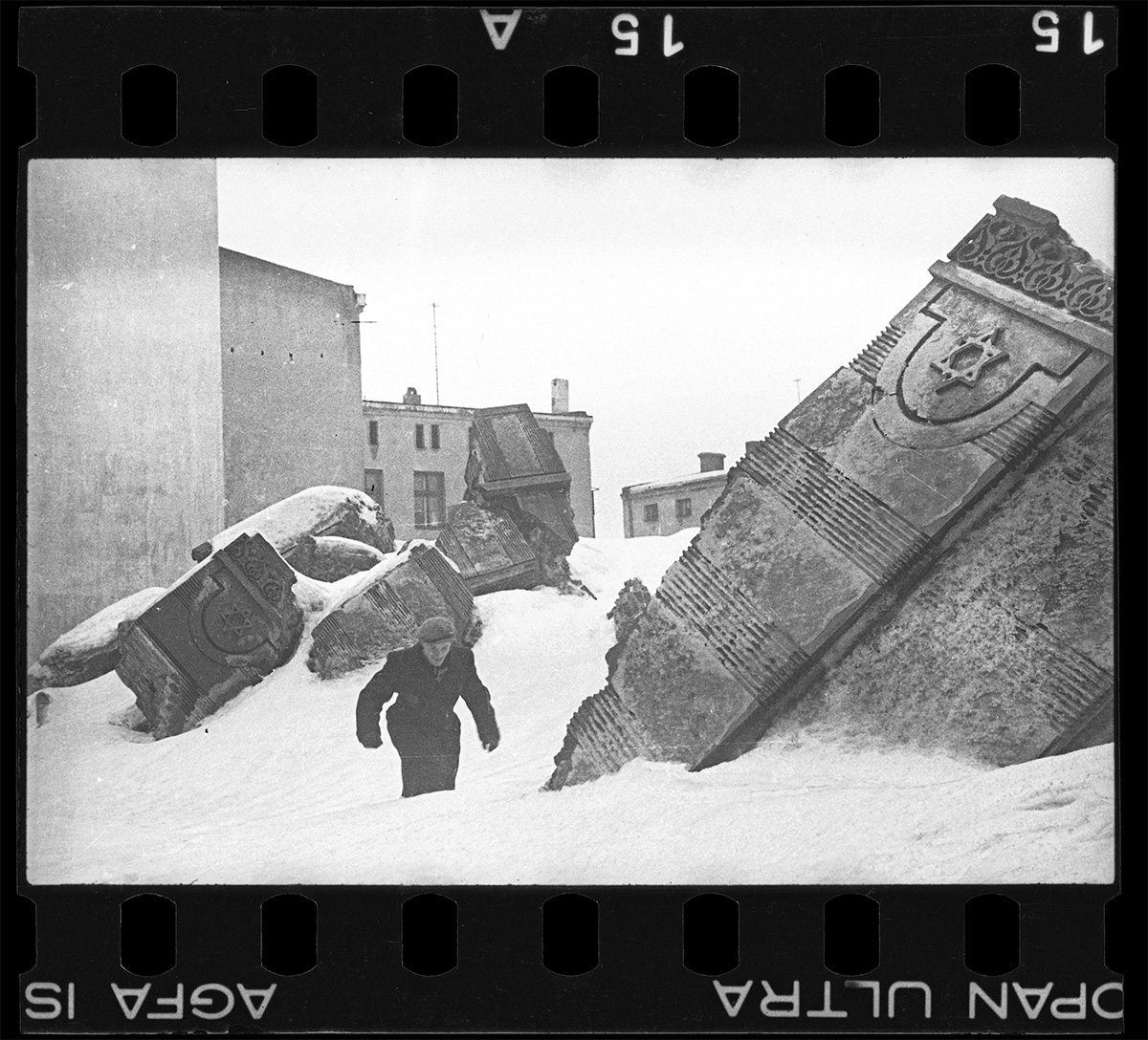Lodz ghetto: Man walking in winter in the ruins of the synagogue on Wolborska street (destroyed by Germans 1939) Henryk Ross (Polish, born in 1910-1991) 1940 Gelatin silver print. *Art Gallery of Ontario. Gift from the Archive of Modern Conflict, 2007. *© Art Gallery of Ontario *Courtesy Museum of Fine Arts, Boston