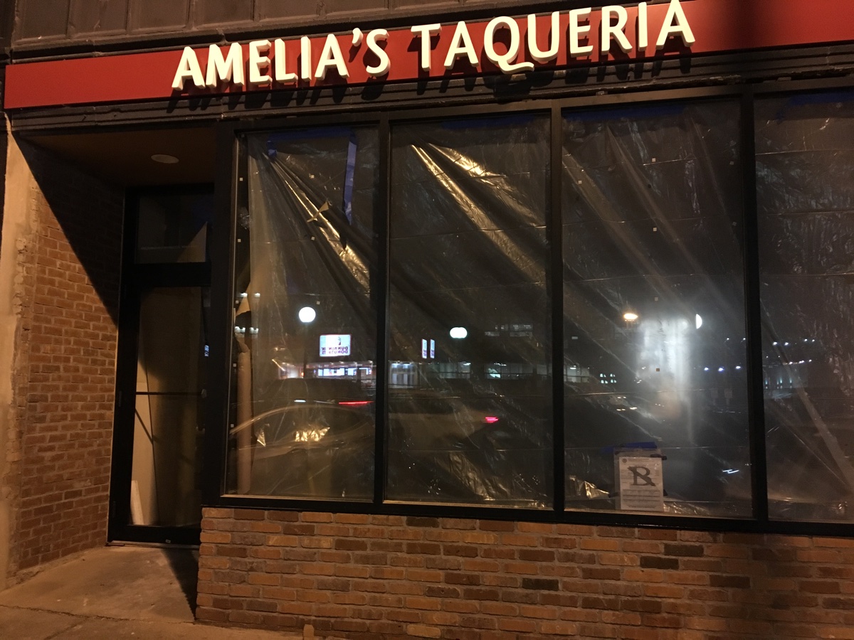 Signs are up for AMelia's Taqueria in Cleveland Circle
