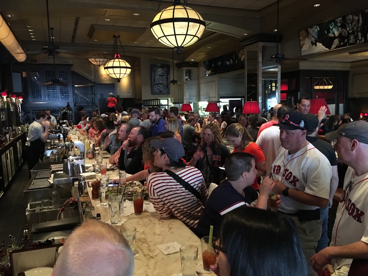 The crowd at the bar at Eastern Standard just after 9 a.m. on Marathon Monday 2017. / Photos by Christy Osler