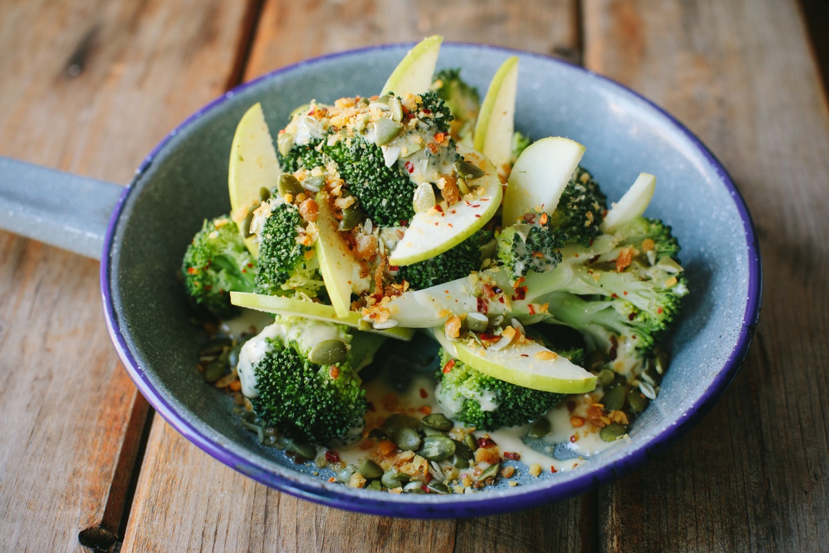 Spicy broccoli with garlic, pepita, and apple at Freepoint Kitchen & Cocktails