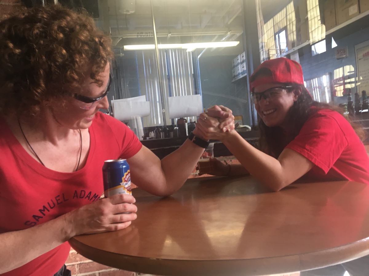 Sam Adams brewer Megan Parisi (L) and Cambridge Brewing's Lee Lord throw down during a Pink Boots Society brew day at Harpoon in March