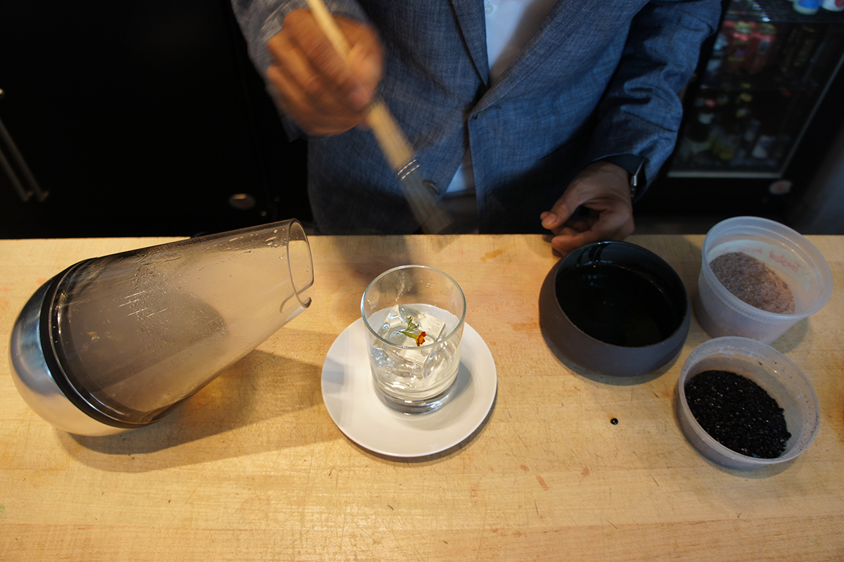 Tenzin Samdo creates a cocktail with Le Whaf at Café ArtScience