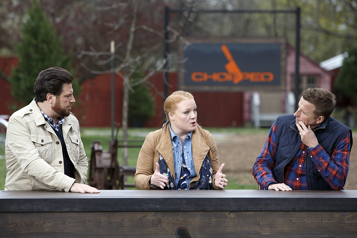 Judges Scott Conant, Tiffani Faison and Marc Murphy deliberate on Chopped Grill Masters