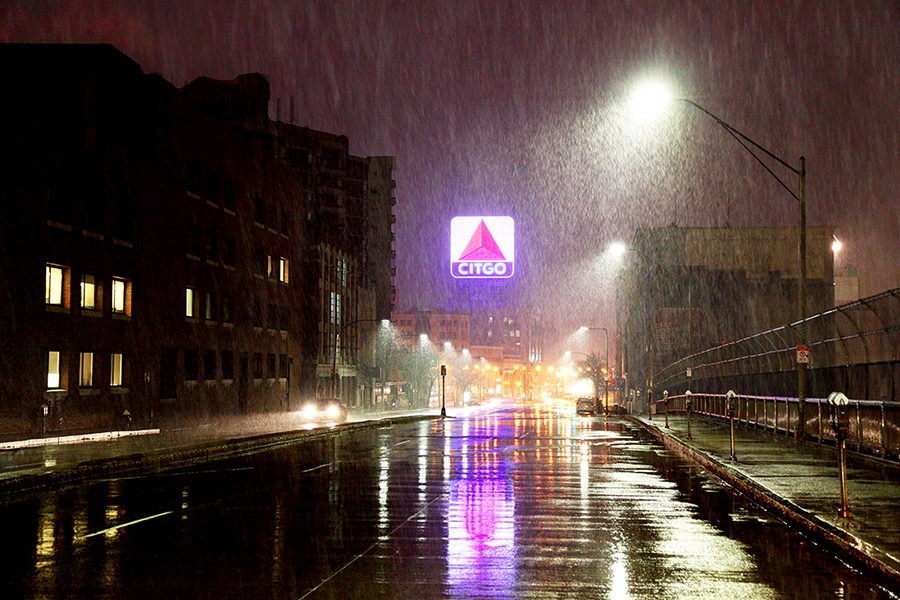 Boston, Massachusetts, USA - February 5, 2016: The iconic Citgo sign along Commonwealth Avenue on a rainy night in the Fenway Kenmore neighborhood